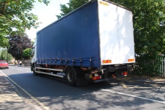 East Street - Large lorry passes school on wrong side of the road due to parked cars.